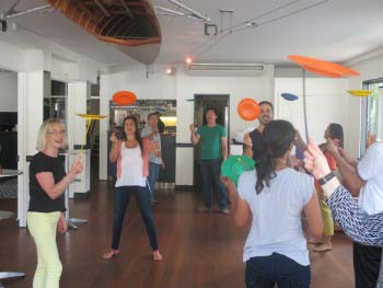 Indoor team building event circus skills workshop with Team Bonding Sydney