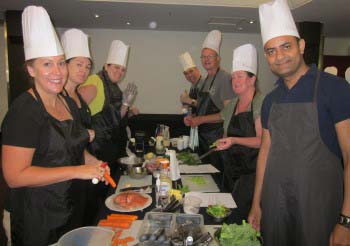 Indoor team building event group cooking class with Team Bonding Sydney